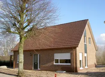 Nelskamp dakpan op woning