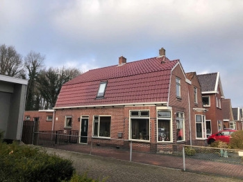 Dakvernieuwing in Muntendam.Oude dakpannen vervangen voor Nelskamp F12 dakpannen Dakvernieuwing in Muntendam.Oude dakpannen vervangen voor Nelskamp F12 dakpannen